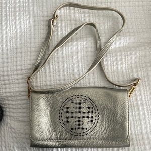 Tory Burch cross body bag in champagne strap extends to 22 length